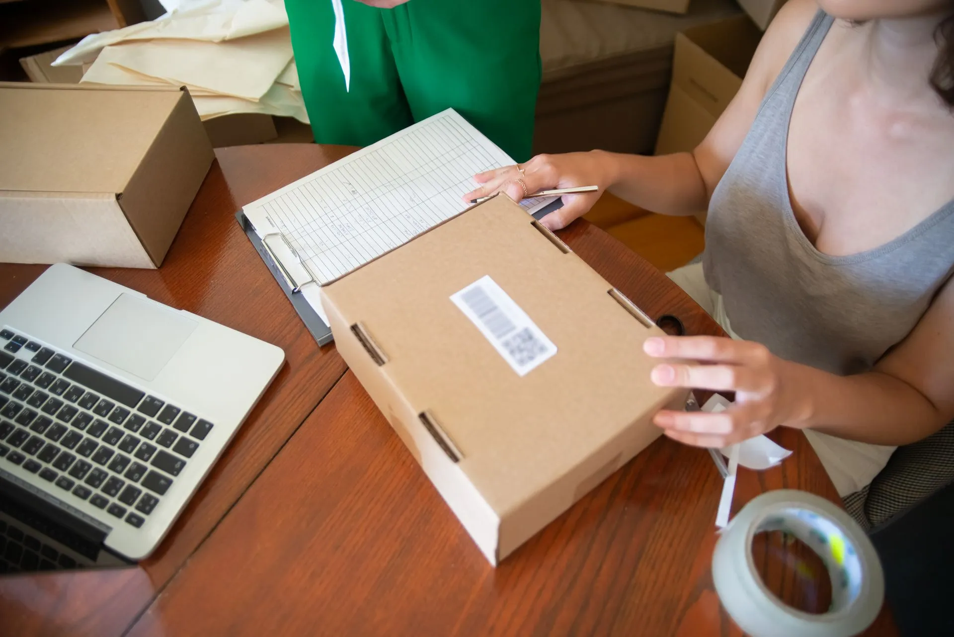Online seller packing orders for dispatch E P Accountants e-commerce accounting